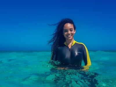 Pollard swimming near the Placencia Producers Cooperative farm where she sources her seaweed. Photo by Nick Perry, Coastline Studios