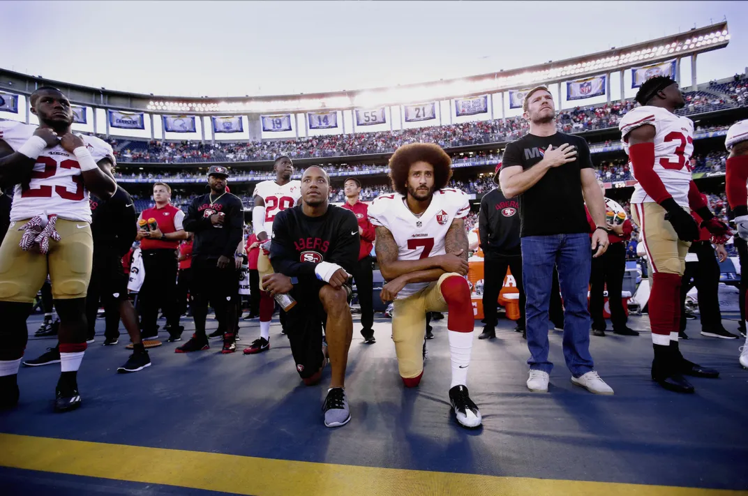 Eric Reid and Colin Kaepernick kneel