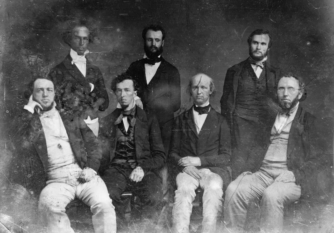 The staff of the New-York Tribune, with Greeley third from the left in the front row