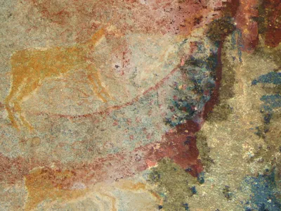 The Horned Serpent Panel, painted by the San people in southern Africa, shows a mysterious creature&#39;s tusks in blue at the upper right.